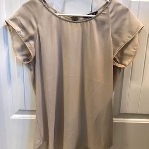 Cream colored silk blouse